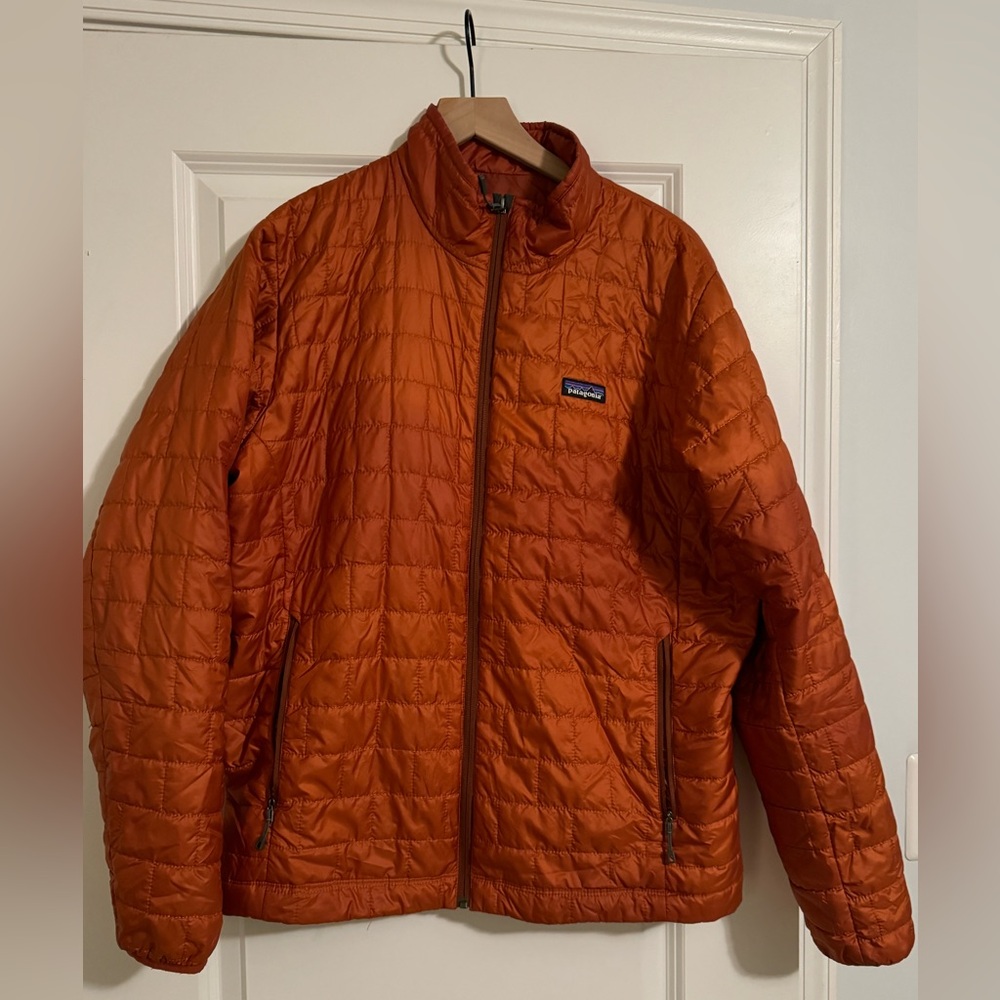 Patagonia nano jacket, size L, rust. Stain on right arm.